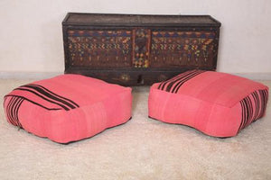 Moroccan rugs and Moroccan poufs in The living room