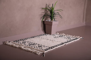 How to protect Moroccan Beni Ourain rug from dust and damage