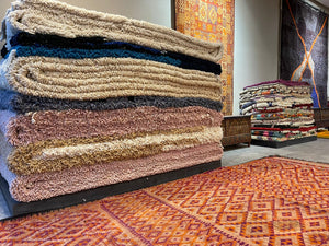 Traditional Moroccan rugs are hand-woven and are made of wool