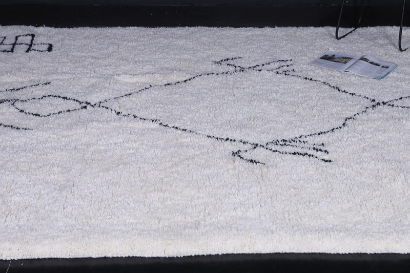 Handmade Moroccan beni ourain rug – White wool with black geometric symbols