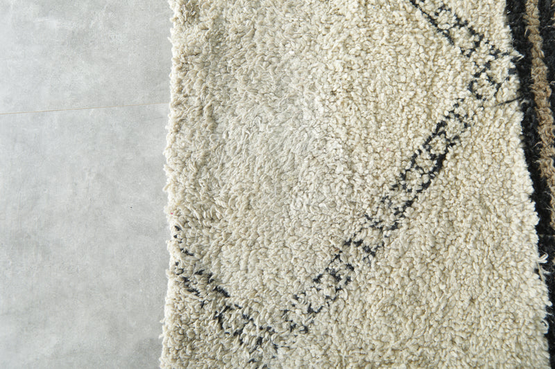 Moroccan Wool Rug 7.5 x 8.7 ft – Handmade Berber Carpet with Ivory, Beige, Black Stripes, Blue Panel & Geometric Tribal Design