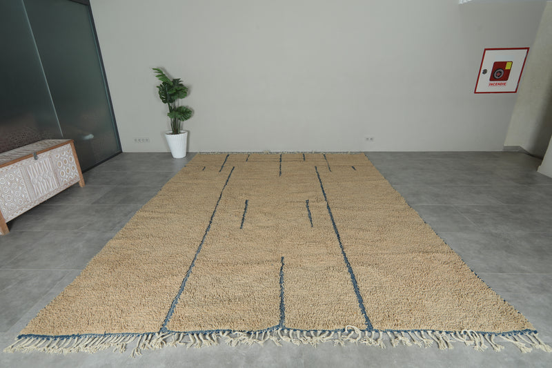 Handmade beige Moroccan rug with blue lines – Custom carpet