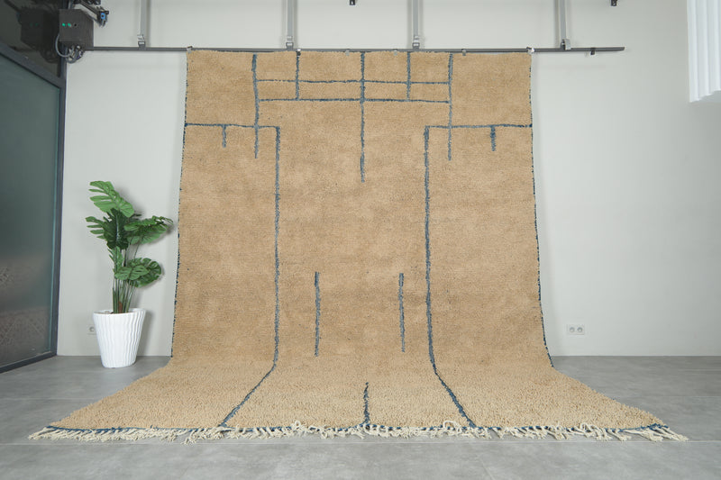 Handmade beige Moroccan rug with blue lines – Custom carpet