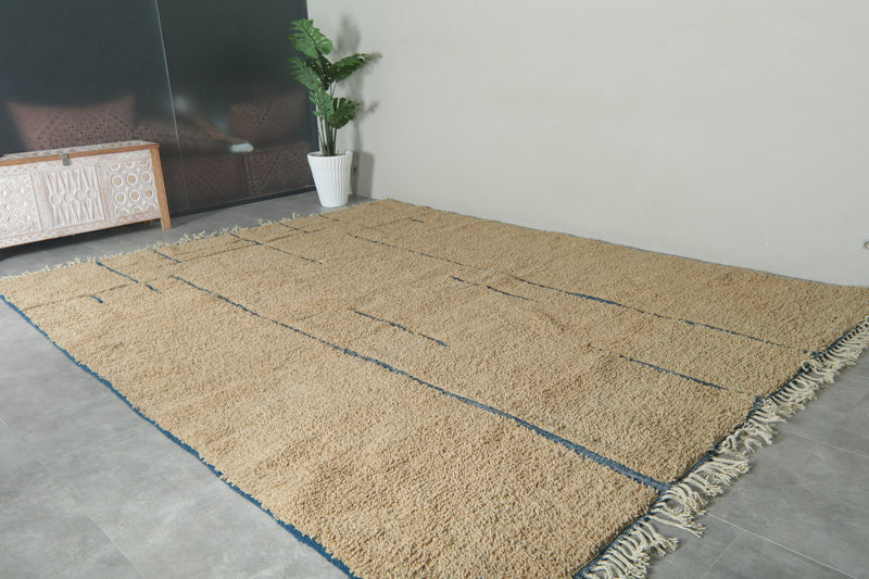 Handmade beige Moroccan rug with blue lines – Custom carpet