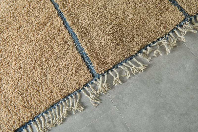 Handmade beige Moroccan rug with blue lines – Custom carpet