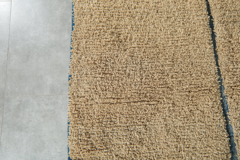 Handmade beige Moroccan rug with blue lines – Custom carpet