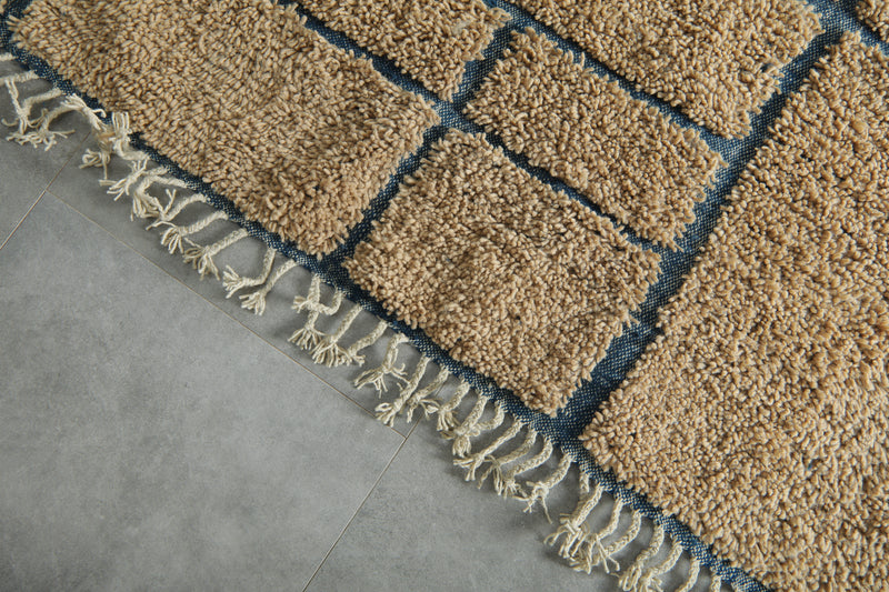 Handmade beige Moroccan rug with blue lines – Custom carpet