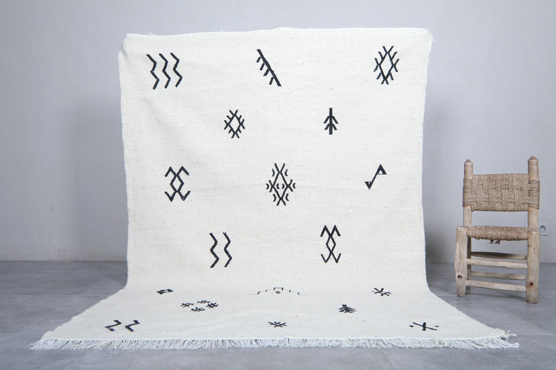 Moroccan Rug - Minimalist Black Symbols 4.8 x 6.9 ft | Handwoven Wool