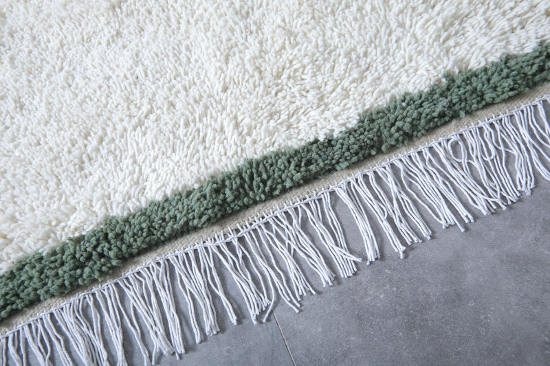 Handwoven Wool Rug in White with Green Frame Border