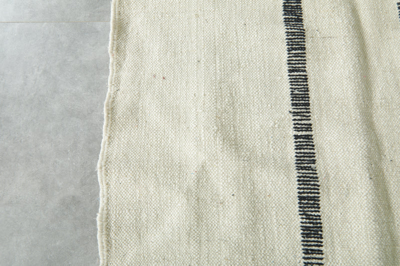 White minimalist Moroccan flatwoven rug - 7.5 ft x 10 ft