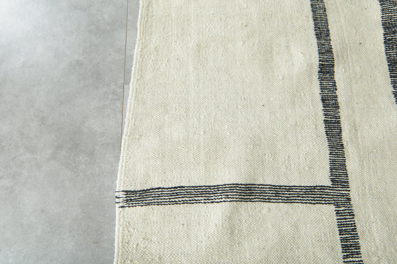Minimalist Moroccan flatwoven rug - White with black linear motif - 7.2 ft x 10.3 ft - Flat woven rugs