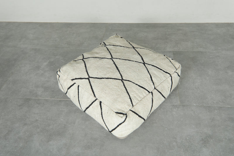 Minimalist white and black Moroccan kilim pouf