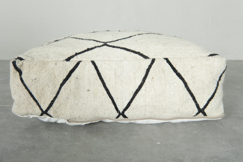 Minimalist white and black Moroccan kilim pouf