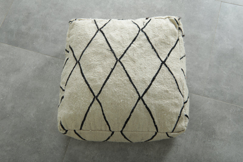 Minimalist white and black Moroccan kilim pouf