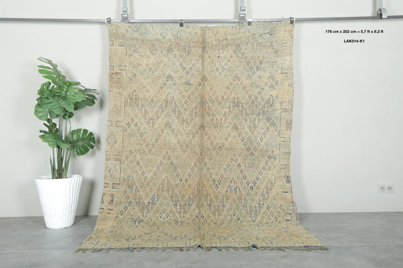 Moroccan Wool rug with beige base and soft geometric accents - 5.7 ft x 8.2 ft