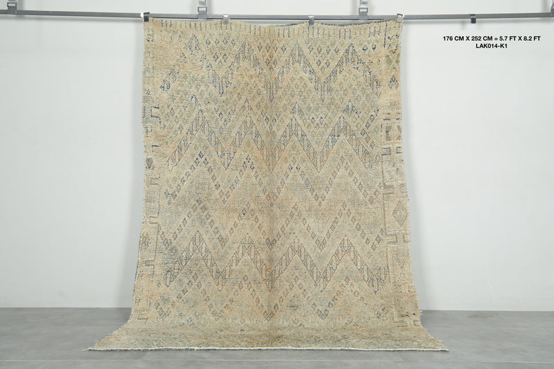 Moroccan Wool rug with beige base and soft geometric accents - 5.7 ft x 8.2 ft