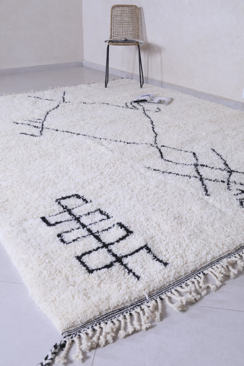 Handmade Moroccan beni ourain rug – White wool with black geometric symbols