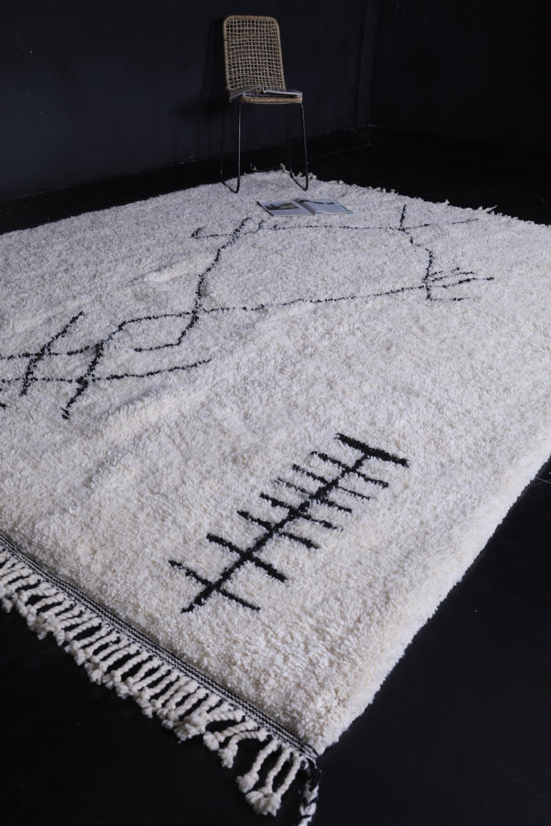 Handmade Moroccan beni ourain rug – White wool with black geometric symbols