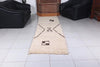 Cream Moroccan runner rug with brown geometric motif - Custom size