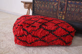 Red Berber ottoman pouf with black stripes