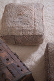 Two handmade berber vintage rug poufs