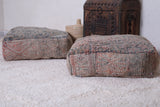Two handmade moroccan wool rug poufs