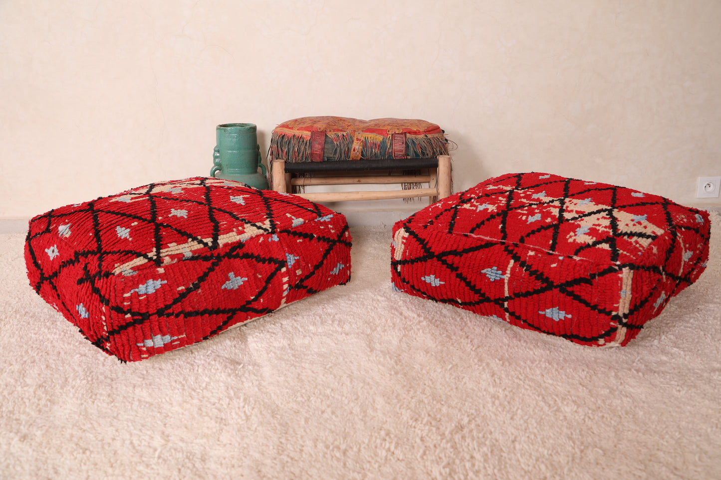 Two Ottoman Moroccan Trellis poufs in Red
