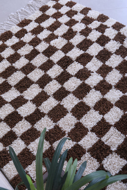 Brown and white checkered rug 5.2 X 5.8 Feet