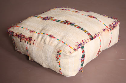 Two Moroccan Beige poufs with colored stripes