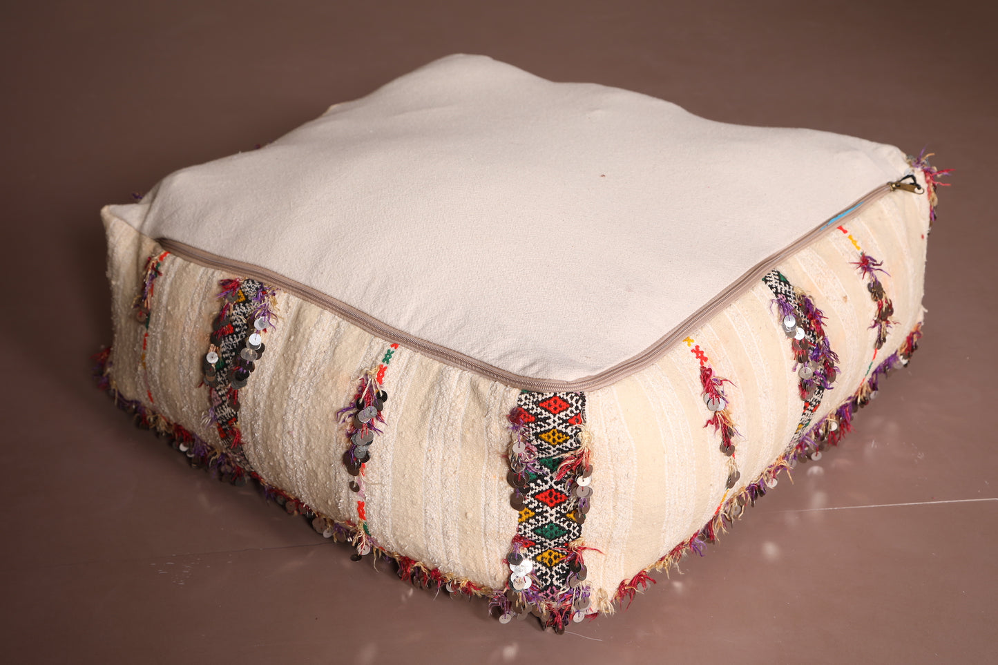 Two Moroccan Beige poufs with colored stripes