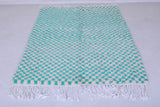 Shaggy moroccan green checkered rug 4.8 X 6.6 Feet