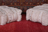 Two White Shaggy ottoman Cushions