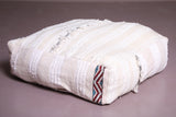 Two Moroccan handwoven tribal poufs