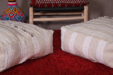 Two Moroccan handwoven tribal poufs