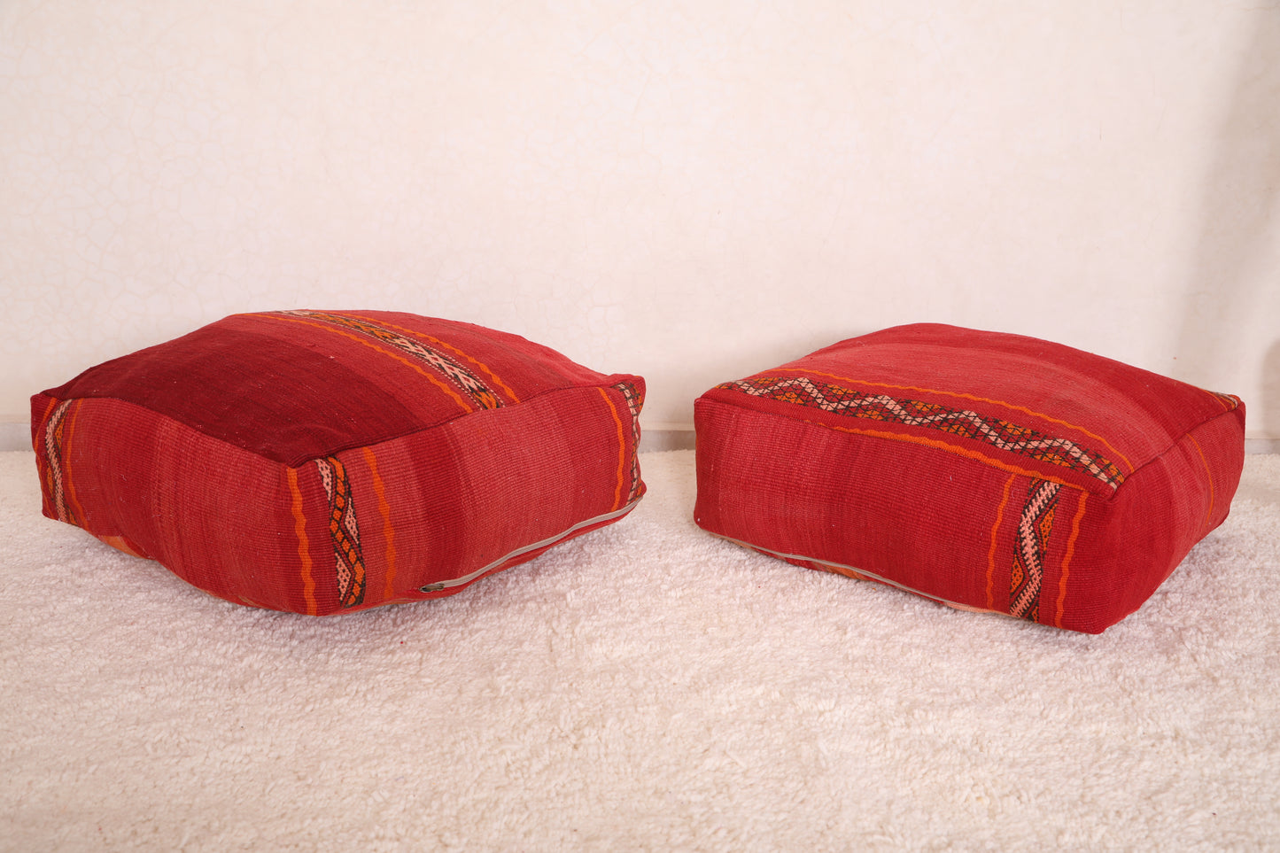 Two Vintage Moroccan Kilim Poufs in red color