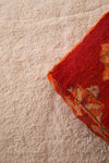 Stunning berber red and orange rug pouf
