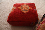 Stunning berber red and orange rug pouf