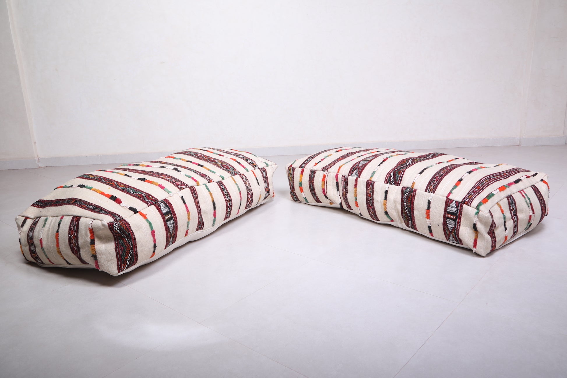 Two Long Moroccan pouf ottoman , Striped rug