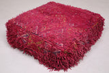 Two Ottoman Moroccan Shaggy Poufs in Dark Red