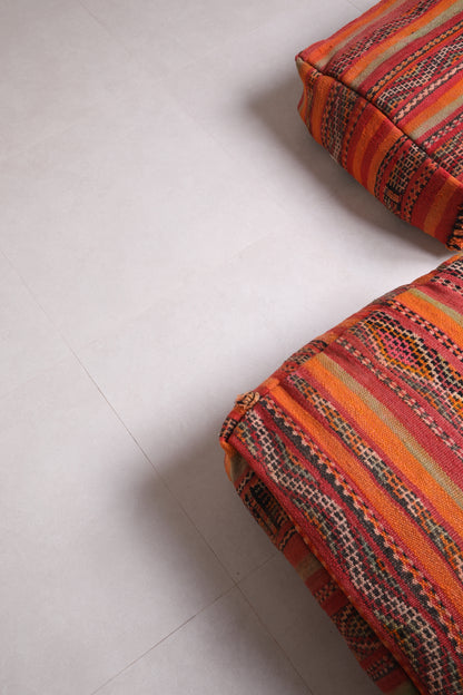 Two ottoman Moroccan woven rug poufs